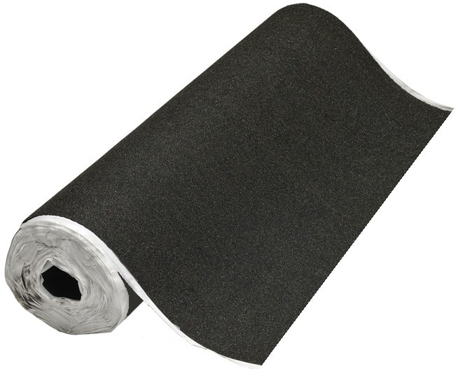 A roll of black carpet is rolled up.