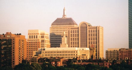 A view of the city skyline from across the street.